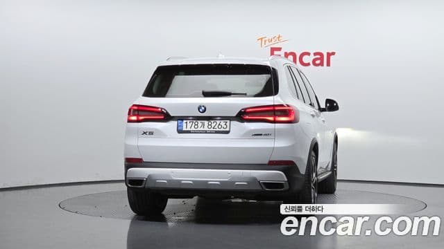 BMW X5 2022 — ფოტო 4/20