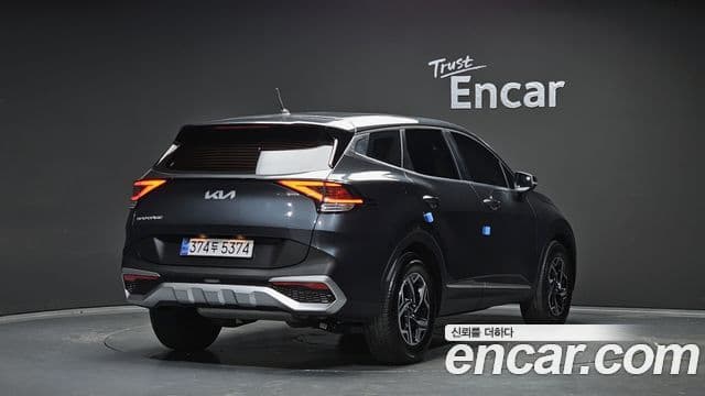 Kia Sportage 2023 — ფოტო 2/20