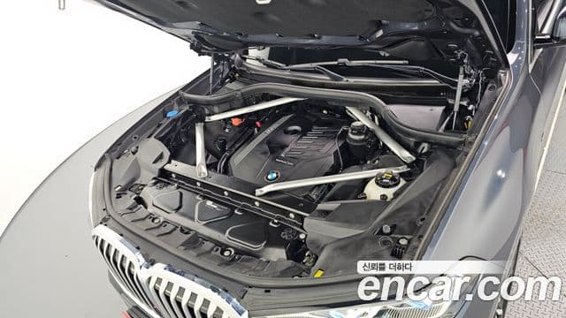 BMW X7 2020 — ფოტო 6/20