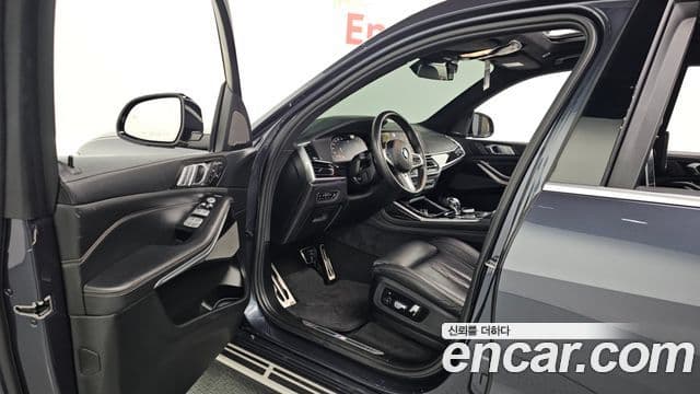 BMW X7 2020 — ფოტო 10/20