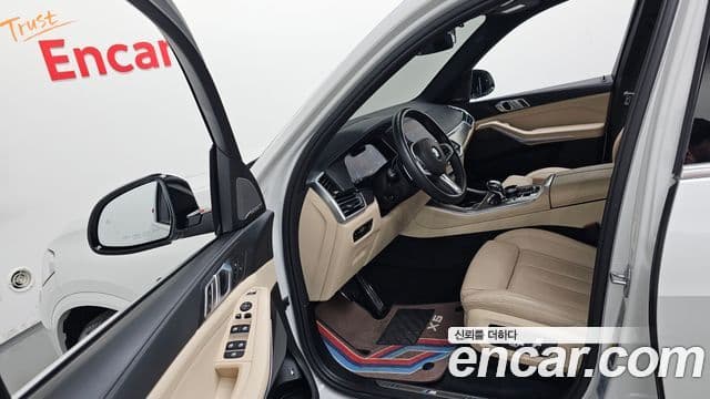 BMW X5 2021 — ფოტო 10/20