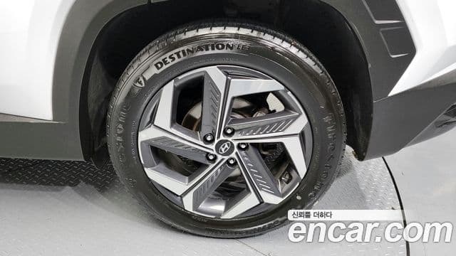 Hyundai Tucson Hybrid 2022 — ფოტო 16/20