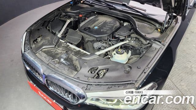 BMW 5 Series 2019 — ფოტო 16/20