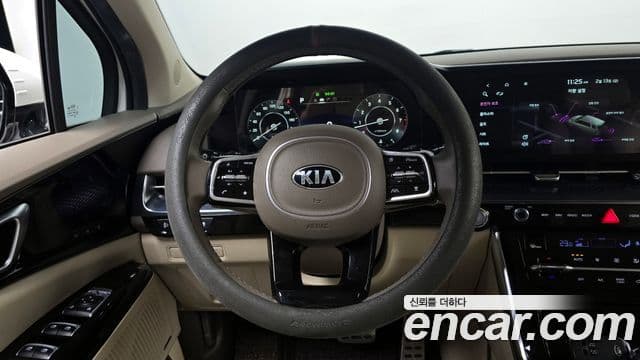 Kia Carnival 2021 — ფოტო 13/20