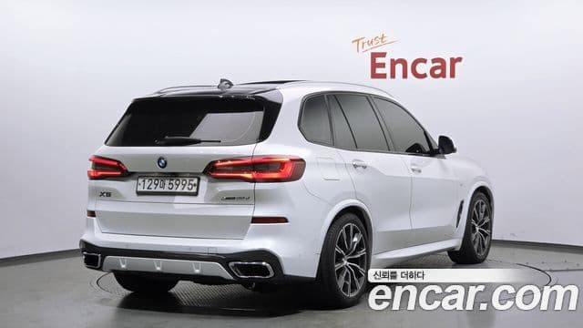 BMW X5 2019 — ფოტო 1/20