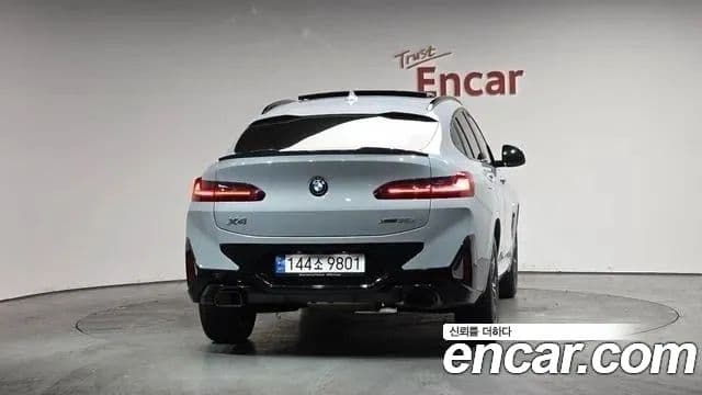 BMW X4 2022 — ფოტო 4/20