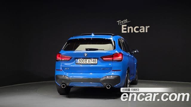 BMW X1 2021 — ფოტო 4/20