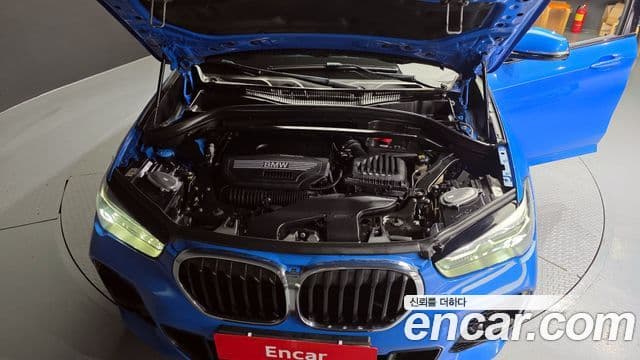 BMW X1 2021 — ფოტო 6/20