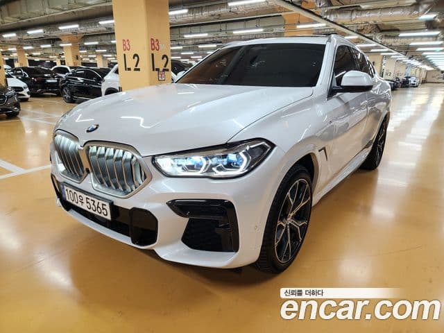 BMW X6 2022 — ფოტო 14/20