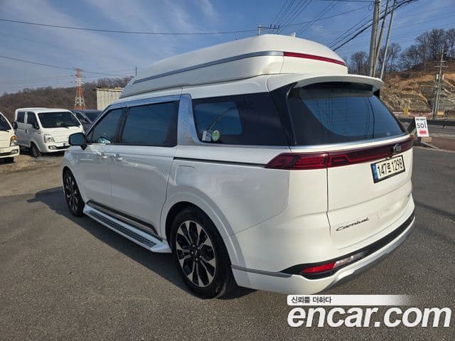 Kia Carnival 2021 — ფოტო 10/20