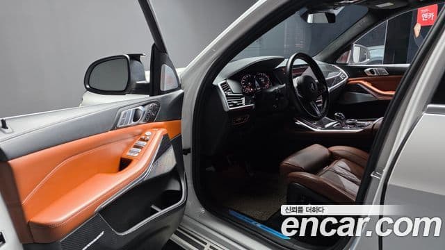BMW X7 2022 — ფოტო 9/20