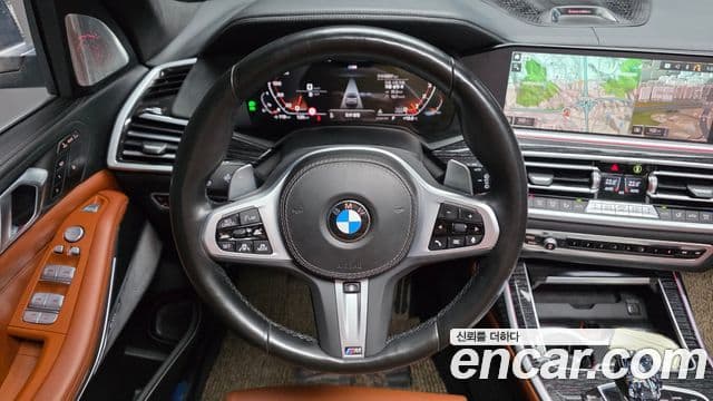 BMW X7 2022 — ფოტო 13/20