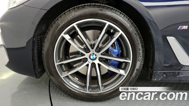 BMW 5 Series 2023 — ფოტო 7/20