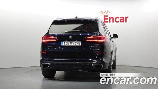 BMW X5 2022 — ფოტო 4/20