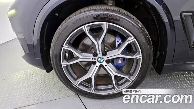 BMW X5 2022 — ფოტო 5/20