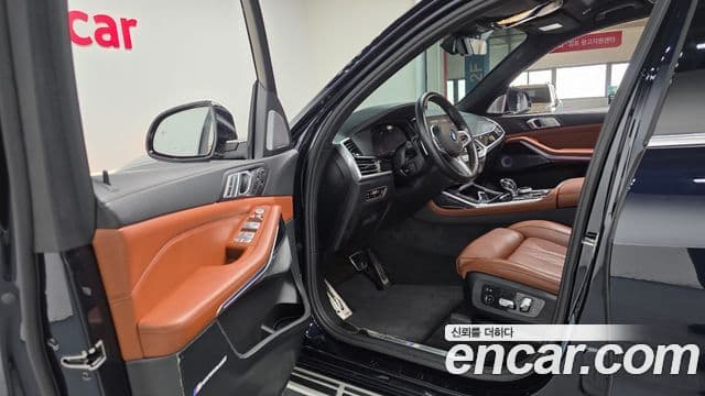 BMW X7 2021 — ფოტო 8/20