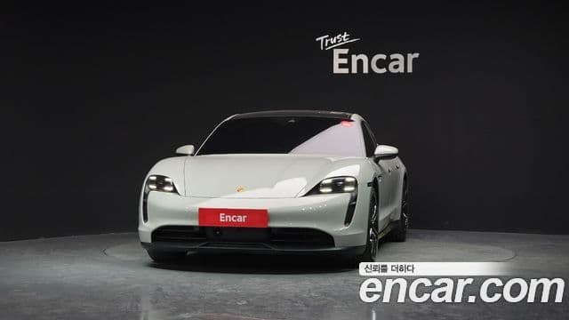 Porsche Taycan 2024 — Photo 31/32