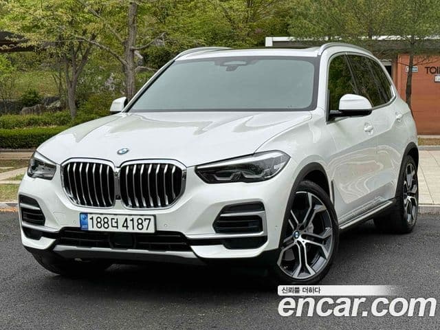 BMW X5 2022 — Фото 1/20