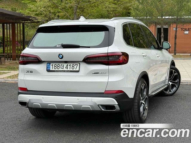 BMW X5 2022 — Фото 4/20
