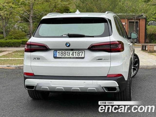 BMW X5 2022 — Фото 5/20