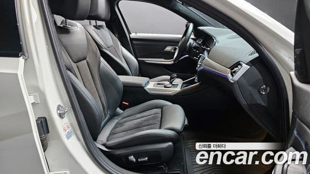 BMW 3 Series 2022 — фото 11 из 20