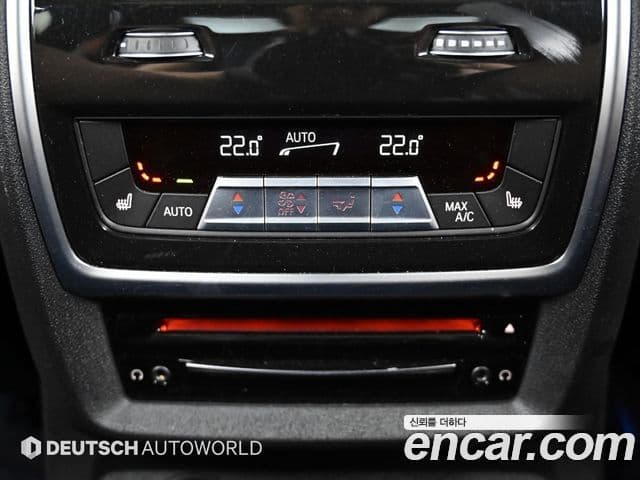 BMW X7 2021 — ფოტო 15/20