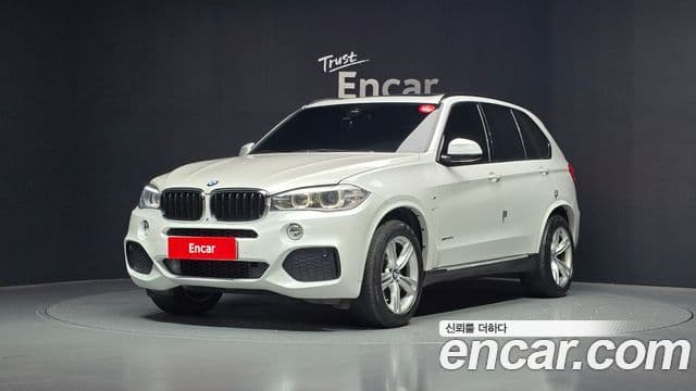 BMW X5 2018 — Фото 1/20