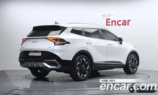 Kia Sportage 2021 — ფოტო 1/20