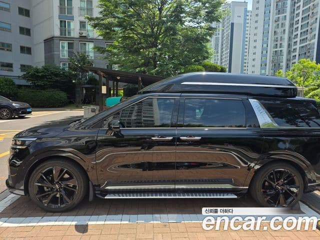 Kia Carnival 2023 — ფოტო 3/13