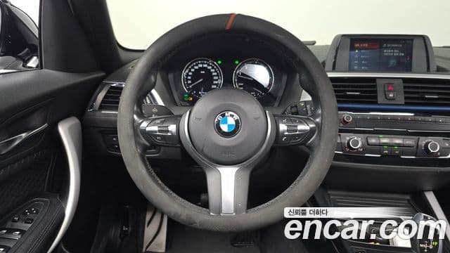 BMW 1 Series 2018 — Фото 13/20