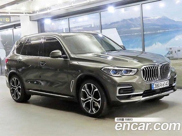 BMW X5 2023 — ფოტო 9/20