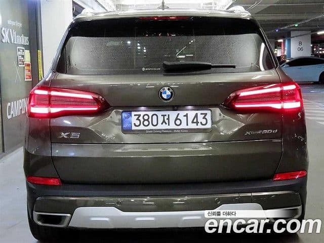 BMW X5 2023 — ფოტო 4/20
