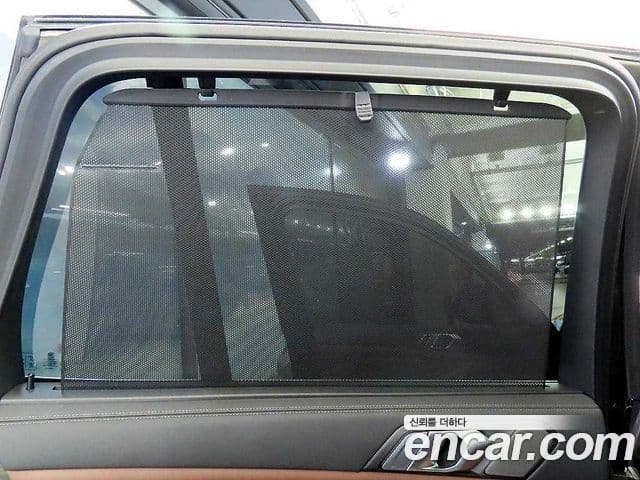 BMW X5 2023 — ფოტო 13/20
