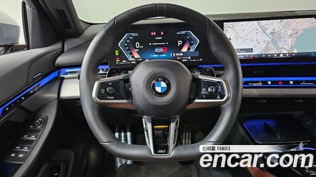 BMW 5 Series 2024 — ფოტო 14/20