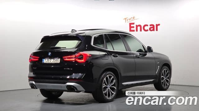 BMW X3 2021 — Photo 14/34