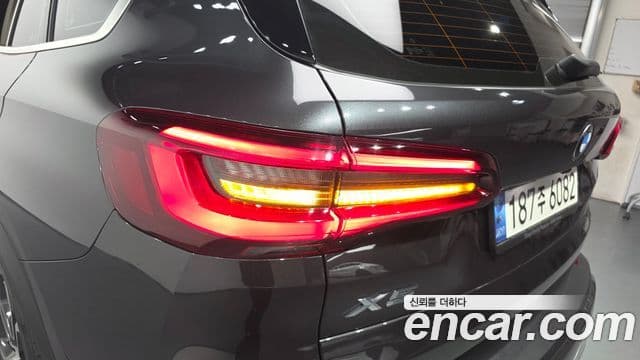 BMW X5 2022 — ფოტო 4/40