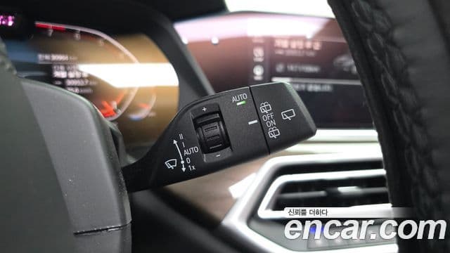 BMW X5 2022 — ფოტო 11/40