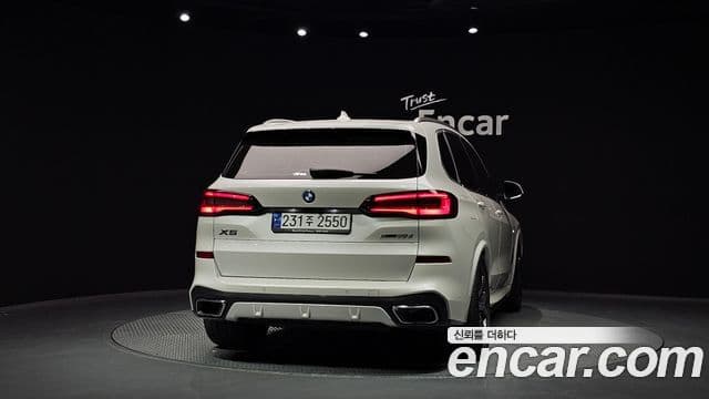 BMW X5 2023 — ფოტო 4/20