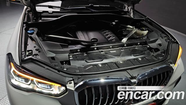 BMW X5 2023 — ფოტო 6/20