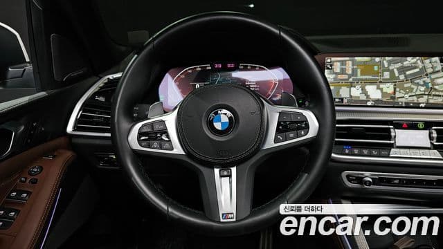 BMW X5 2023 — ფოტო 13/20