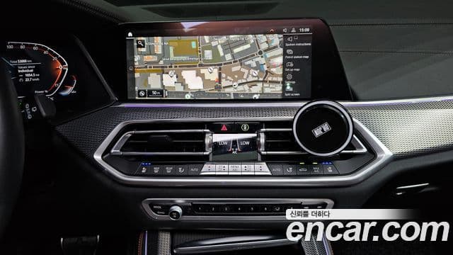 BMW X5 2023 — ფოტო 14/20