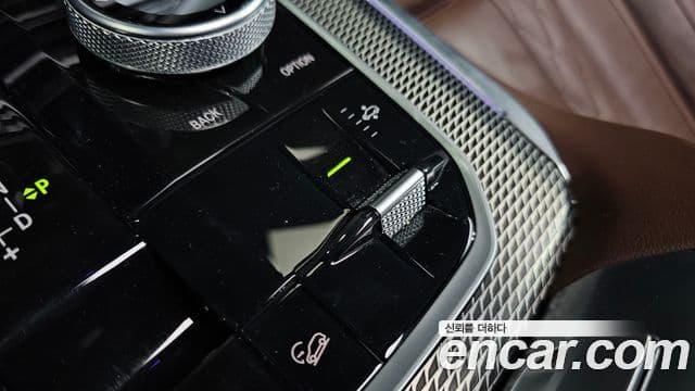 BMW X5 2023 — ფოტო 16/20