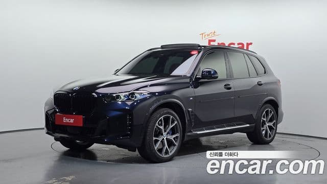 BMW X5 2024 — Фото 1/20