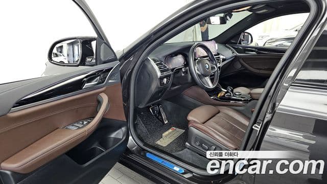 BMW X4 2024 — Фото 10/20