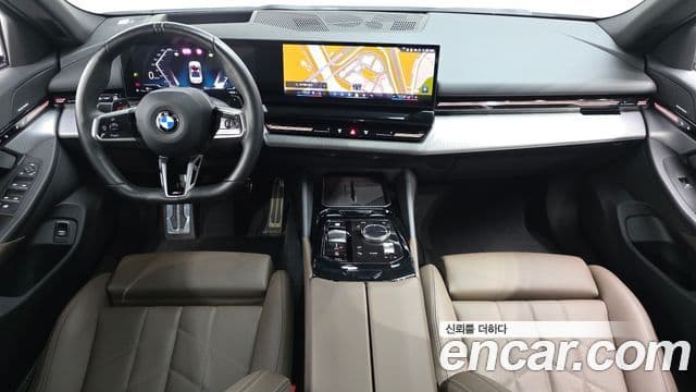 BMW 5 Series 2023 — ფოტო 7/20