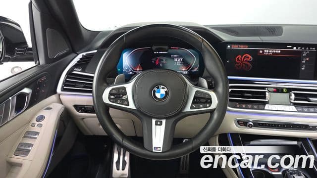BMW X7 2022 — ფოტო 13/20