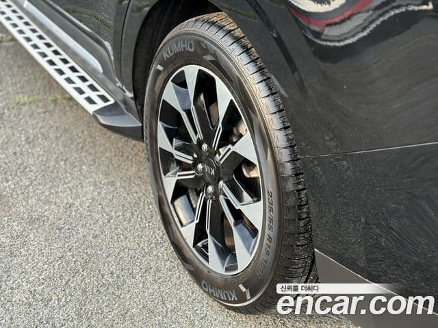 Kia Carnival 2021 — ფოტო 15/20