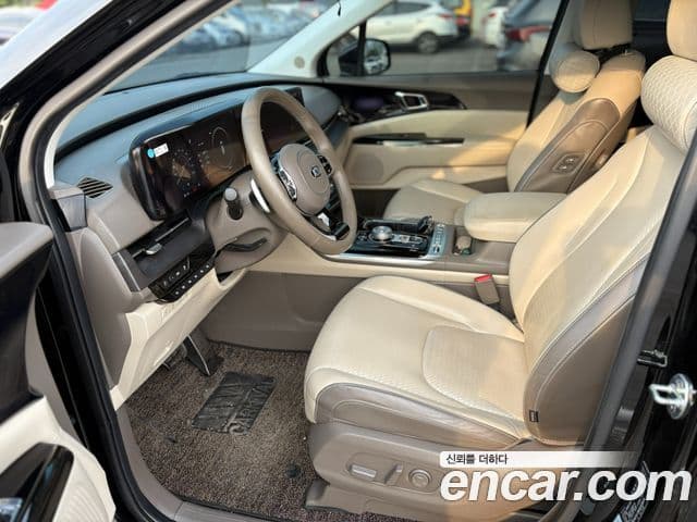 Kia Carnival 2021 — ფოტო 19/20