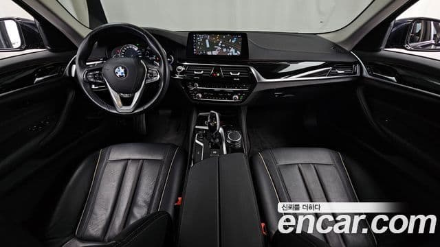 BMW 5 Series 2018 — Фото 7/20
