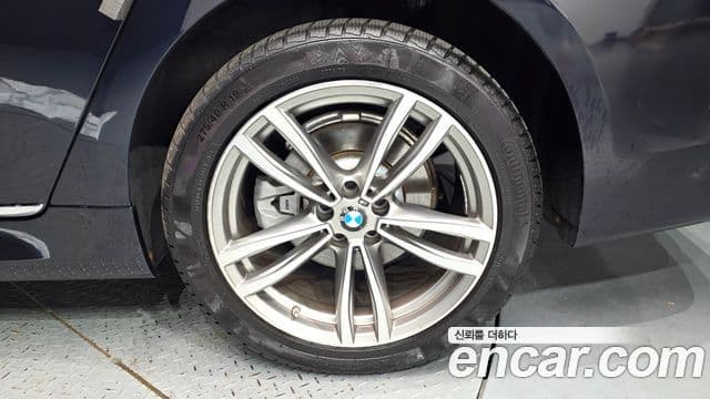 BMW 7 Series 2018 — ფოტო 6/35
